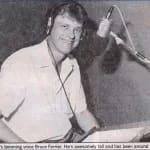 Bruce Ferrier in the Channel 7 booth with his booming voice